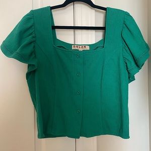Kelly green Dolan cap sleeve top.